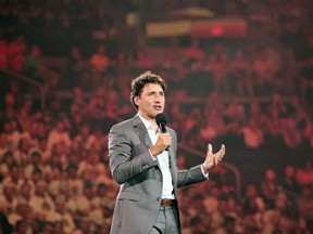 Prime Minister Justin Trudeau brings greetings during the opening ceremony for the 2017 Canada Summer at the Bell MTS Place in Winnipeg, Man., on Friday, July 28, 2017. (Brook Jones/Postmedia Network)