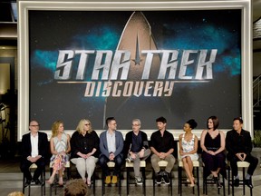 Executive producers Akiva Goldsman, from left, Heather Kadin, Gretchen Berg, Aaron Harberts and Alex Kurtzman and actors James Frain, Sonequa Martin-Green, Mary Chieffo and Jason Isaacs participate in the "Star: Trek Discovery" panel during the CBS Television Critics Association Summer Press Tour at CBS Studio Center on Tuesday, Aug. 1, 2017, in Beverly Hills, Calif. (Photo by Chris Pizzello/Invision/AP)