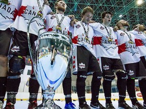Belleville's Pat Millington, far left, and his Canadian teammates sing the national anthem after capturing the gold medal at the 2017 men's ball hockey world championships held earlier this summer in the Czech Republic. (www.richtrik.cz)
