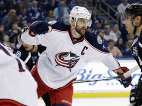 Columbus Blue Jackets left wing Nick Foligno (71) celebrates after scoring against the Tampa Bay Lightning during the third period of an NHL hockey game Friday, Jan. 13, 2017, in Tampa, Fla. The Blue Jackets won 3-1. (AP Photo/Chris O'Meara) ORG XMIT: TPA119