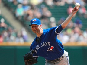 Toronto Blue Jays starting pitcher J.A. Happ delivers during the first inning of a baseball game against the Chicago White Sox in Chicago on Aug. 2, 2017. (AP Photo/Jeff Haynes)