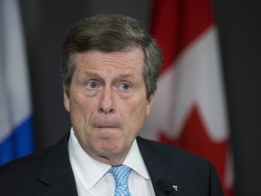 Mayor John Tory chats during a media availability on Monday, June 19, 2017. (CRAIG ROBERTSON/TORONTO SUN)