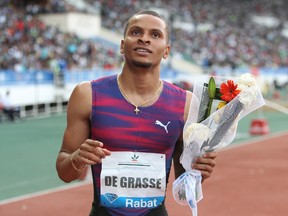 Canadian Andre De Grasse celebrates after winning the men's 200-meter at the International Mohammed VI track and field meeting in Rabat, Morocco, on July 16, 2017. (AP Photo/Abdeljalil Bounhar)
