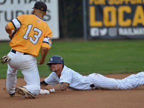 London Majors Chris McQueen steals second base in front of Burlington second baseman Reese O'Farrel during game one of their IBL game against the Burlington Herd at Labatt Park on Wednesday August 2, 2017.  (MORRIS LAMONT, The London Free Press)