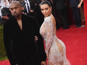 Kanye West (L) and Kim Kardashian.  (Mike Coppola/Getty Images)