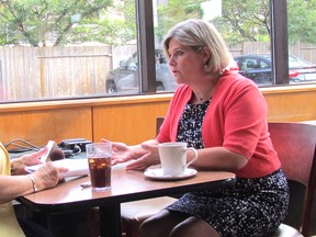 Ontario NDP Leader Andrea Horwath meets with nurse practitioner Lynne Withers to discuss the need for a broad inquiry into long-term senior care, in a coffee shop in Sarnia on Thursday, Aug. 3, 2017. (Jeremiah Rodriguez/Postmedia Network)