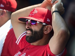 Toronto Blue Jays' Jose Bautista watches the game between the Jays and Los Angeles Angels from the bench, in Toronto on July 30, 2017. (THE CANADIAN PRESS/Fred Thornhill)