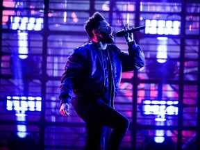 The Weeknd performs on stage during the Roskilde Festival in Roskilde on June 28, 2017. / AFP PHOTO / Scanpix Denmark / Ida Marie Odgaard /
