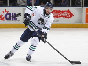 Colin MacDonald of the Plymouth Whalers makes a pass in game 1 of the Western Conference Final against the London Knights on April 19, 2013 at the Budweiser Gardens in London, Ontario, Canada. (Getty Images)
