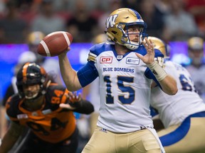 Winnipeg Blue Bombers quarterback Matt Nichols passes against the B.C. Lions during the first half of a CFL game in Vancouver on July 21, 2017. (THE CANADIAN PRESS/Darryl Dyck)