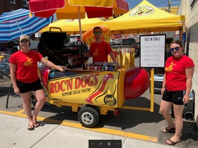 SUBMITTED PHOTO
Youths serve up hotdogs at the ROCâÄôN Dog Food Cart in Picton on Tuesday.