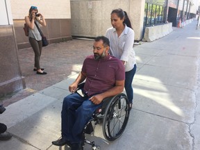 Sukhjit Johal and his wife Harjit are hoping to have a special tricycle that was stolen from him returned. (Jason Friesen/Winnipeg Sun)