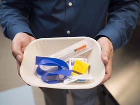 A injection kit is seen inside the newly-opened Fraser Health supervised consumption site in Surrey, B.C. Tuesday, June 6, 2017. Drug users in Surrey, B.C., will be allowed to use substances orally and nasally, not just by injection, at two supervised consumption sites in the city, the first time Health Canada has approved such an exemption. Provincial health officer Dr. Perry Kendall says that means more overdoses will be reversed, saving lives in the midst of an opioid epidemic. (THE CANADIAN PRESS/Jonathan Hayward)
