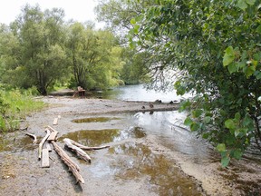The Cataraqui Region Conservation Authority reminds the public that the shoreline part of Trail 1 at Lemoine Point Conservation Area is closed to the public due to flooding and damage caused by debris and erosion, seen here in Kingston on Thursday. (Julia McKay/The Whig-Standard)