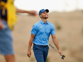 Stephen Curry shares a laugh with his playing partners while playing the tenth hole during round one of the Ellie Mae Classic at TCP Stonebrae on Aug. 3, 2017. (Lachlan Cunningham/Getty Images)