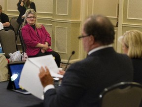 Susan Horvath, daughter of Arpad Horvath, one of Elizabeth Wettlaufer?s eight murder victims, attends a news conference Thursday at which lead counsel William McDowell and senior counsel Elizabeth Hewitt announced details of the upcoming public inquiry into the murder of the nursing-home residents. (DEREK RUTTAN, The London Free Press)