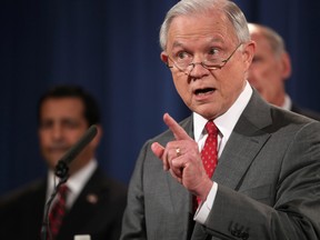 Attorney General Jeff Sessions, accompanied by, from left, National Counterintelligence and Security Center Director William Evanina, Director of National Intelligence Dan Coats, speaks during a news conference at the Justice Department in Washington, Friday, Aug. 4, 2017, on leaks of classified material threatening national security. (AP Andrew Harnik)