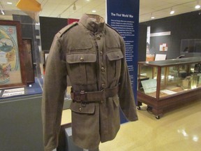 A First World War uniform displayed in the 2015 Lambton at War exhibition at the Lambton Heritage Museum is shown in this file photo. A reformatted version of the exhibition will be shown at the Judith and Norman Alix Art Gallery in Sarnia Sept. 1 through Jan. 7, alongside Witness: Canadian Art of the First World War, a travelling show from the Canadian War Museum. (File photo/Sarnia Observer/Postmedia Network)
