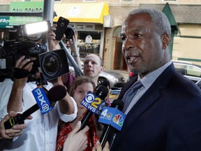 In this April 11, 2017, file photo, former New York Knicks star Charles Oakley talks to the press after an appearance in Manhattan Criminal Court, in New York. (AP Photo/Richard Drew, File)