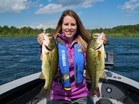 Columnist Ashley Rae with some largemouth bass caught and released on Loughborough Lake. (Ashley Rae/Postmedia Network)