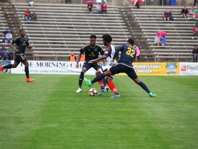 Fury FC’s Michael Salazar gets tested by Bethlehem Steel FC’s Marcus Epps (left) and Giliano Wijnaldum earlier this season. (Bethlehem Steel FC/PHOTO)