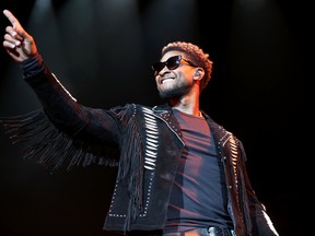 Usher performs at the Scotiabank Saddledome in Calgary on Saturday July 15, 2017. (Leah Hennel/Postmedia )