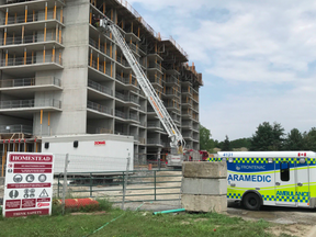 Emergency services respond to a wall collapse at a construction site on Friday morning on Old Mill Road. Photo supplied by Frontenac Paramedic Services