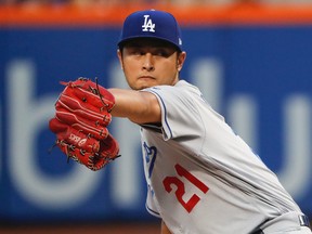 Yu Darvish threw seven shutout innings in his first start as a Dodger on Friday, a far cry from his last outing in Texas. (Julie Jacobsen, AP)