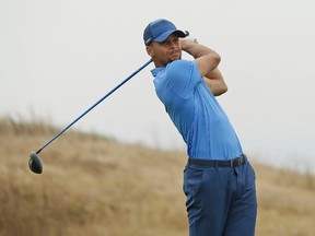 Golden State Warriors star Stephen Curry follows his drive from the 17th tee during the Web.com Tour’s Ellie Mae Classic golf tournament Thursday, Aug. 3, 2017, in Hayward, Calif. (AP Photo/Eric Risberg)