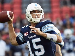 Toronto Argonauts quarterback Ricky Ray (15) passes against the Calgary Stampeders during first half CFL football action in Toronto on Thursday, August 3, 2017. The Toronto Argonauts continued assessing quarterback Ricky Ray's right shoulder injury Friday and expect to know his status when they reconvene Sunday. (THE CANADIAN PRESS/Nathan Denette)