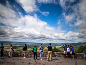 The mix of sun and clouds and cooler temperatures made for a perfect day to get out to Champlain Lookout in Gatineau Park Sunday August 6, 2017.   Ashley Fraser/Postmedia