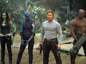 This image released by Disney-Marvel shows Zoe Saldana, from left, Karen Gillan, Chris Pratt, Dave Bautista and Rocket, voiced by Bradley Cooper, in a scene from, "Guardians Of The Galaxy Vol. 2." (Disney-Marvel via AP)