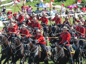 32 horses and riders make up the RCMP musical ride performing in front of a few thousand people at Amberlea Meadows south of Edmonton on August 6, 2017. Photo by Shaughn Butts / Postmedia