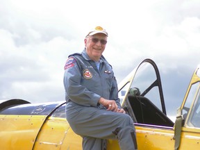 Bill Long, 81, flew the same Harvard 63 years ago while learning to become a RCAF pilot. After decades as a RCAF and commercial pilot he took his last flight in a Harvard on Saturday at Tillsonburg Airport. (HEATHER RIVERS/WOODSTOCK SENTINEL-REVIEW)