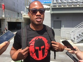 Henry Burris talks to the media at Ottawa Redblacks practice in Ottawa on Aug. 7, 2017. (Tim Baines/Postmedia)