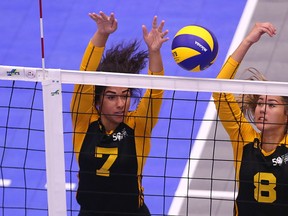 Laura Hill (left) and Tori Isfjord of Team Manitoba go up to block during Canada Games action against Team Yukon at the Sport For Life Centre in Winnipeg on Mon., Aug. 7, 2017. Kevin King/Winnipeg Sun/Postmedia Network