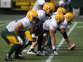 The Edmonton Eskimo offensive line practices in preparation of Friday's game against the B.C. Lions on Tuesday July 25, 2017, in Edmonton.