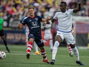FC Edmonton defender Abdoulaye Diakité, right, knocks the ball away from Indy Eleven striker David Goldsmith in North American Soccer League play at Michael A. Carroll Stadium in Indianapolis, Indiana on Saturday Aug. 5, 2017. Diakité was named NASL Player of the Week on Monday.