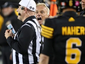 Jeff Reinebold yells at a referee following an attempted on-side kick by the Hamilton Tiger-Cats against the Edmonton Eskimos in Hamilton on Oct. 28, 2016. (THE CANADIAN PRESS/Peter Power)