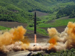 This file photo distributed by the North Korean government shows what was said to be the launch of a Hwasong-14 intercontinental ballistic missile, ICBM, in North Korea's northwest, Tuesday, July 4, 2017. (Korean Central News Agency/Korea News Service via AP)
