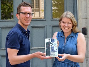 Joe Cattana/For The Whig-Standard
Kevin Collins, co-ordinator of student development at the Student Experience Office, left,and Carolyn Thompson, Queen’s Reads student co-ordinator, hold Queen’s Reads featured novel The Break.
