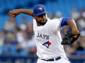 Toronto Blue Jays starting pitcher Cesar Valdez delivers a pitch against the Oakland Athletics during MLB action in Toronto on July 25, 2017. (THE CANADIAN PRESS/Mark Blinch)