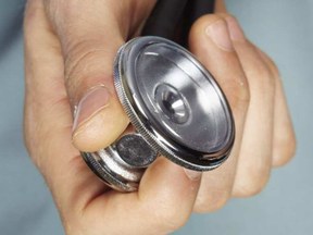 Doctor holding stethoscope