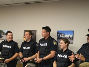 Four new officers joined the Sarnia Police Services during a Tuesday swearing-in ceremony. From left are Cody Simpson, Christopher Beauchamp, Steven Farlow, Danielle Girard and training officer Const. Shawn Osborne. (NEIL BOWEN/Sarnia Observer)