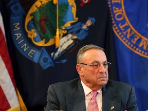 In this May 10, 2017 photo, Maine Gov. Paul LePage pauses during a meeting to discuss the state's efforts to fight the opioid epidemic at the State House in Augusta, Maine. (AP Photo/Robert F. Bukaty, File)