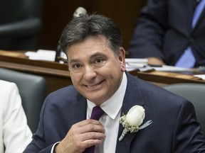 Finance Minsiter Charles Sousa unveils this year's budget at Queen's Park on April 27. (CRAIG ROBERTSON, Toronto Sun)