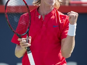 Denis Shapovalov of Canada celebrates a point over Rogerio Dutra Silva of Brazil during first round of play at the Rogers Cup tennis tournament on Aug. 8, 2017. (THE CANADIAN PRESS/Paul Chiasson)