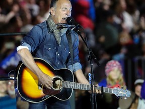 In this Nov. 7, 2016, file photo Bruce Springsteen performs during a Hillary Clinton campaign event at Independence Mall in Philadelphia. Springsteen plans to make his Broadway debut onstage this fall at the Walter Kerr Theatre in a solo show in which he performs songs from his career, interspersed with readings of his best-selling memoir “Born to Run.” “Springsteen on Broadway” begins previews Oct. 3, 2017, ahead of an Oct. 12 opening. (AP Photo/Matt Slocum, File)