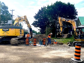 BRUCE BELL/THE INTELLIGENCER
Crews from McInroy Maines Construction continue to work on a section of Belleville Road in Wellington, between Niles Street and Main Street, in an effort to finish the rehabilitation project this summer.