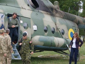 Submitted photo
Lubomyr Luciuk makes his way off an Ukrainian Armed Forces Mil Mi-8 helicopter after arriving at the Demining Centre.